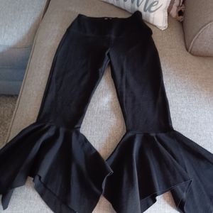 Black flow capris with ruffle flare